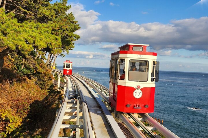 Ride the scenic cable cars of Haeundae Blueline Park gliding along the coastline with stunning ocean views perfect for group adventures and unforgettable memories in Busan.